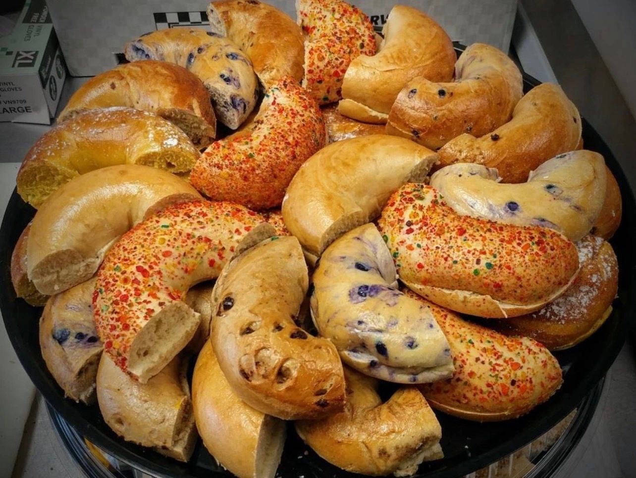 Freshly baked bagels with toppings